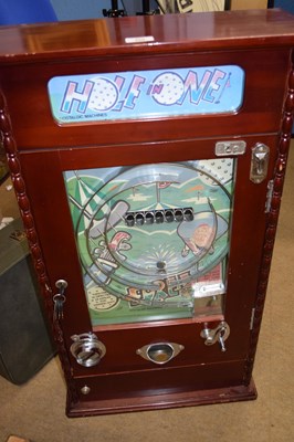 Lot 468 - A vintage hardwood cased, coin operated " Hole...