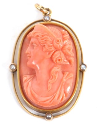 Lot 88 - A late 19th century coral cameo, the carved...