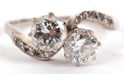 Lot 13 - A 'toi et moi' two stone diamond ring, the...