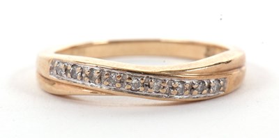 Lot 54 - A 9ct diamond ring, with crossover style band,...