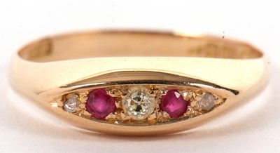 Lot 38 - An 18ct ruby and diamond ring, the marquise...