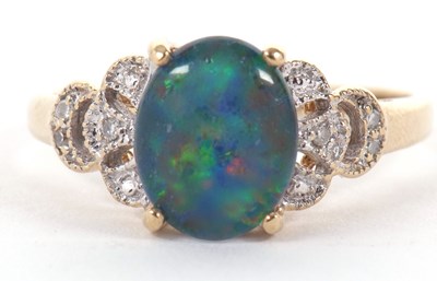 Lot 62 - A 9k opal triplet and diamond ring, the oval...