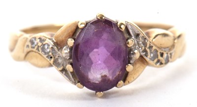 Lot 39 - A 9ct amethyst and diamond ring, the oval...