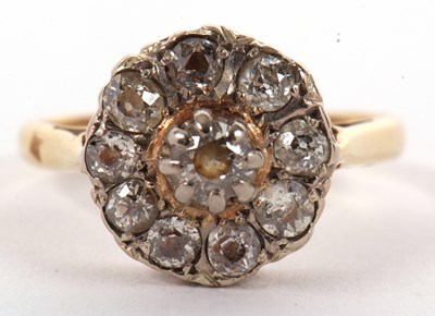 Lot 40 - An 18ct diamond cluster ring, the central...