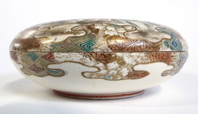 Lot 265 - A Japanese Satsuma ware circular box and cover,...