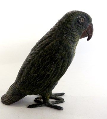 Lot 360 - A green painted Spelter model of a parrot,...