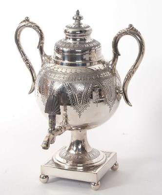 Lot 384 - Late Victorian silver plated samovar with twin...