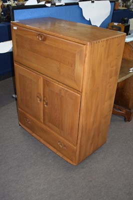 Lot 551 - Ercol light elm drinks cabinet with drop down...