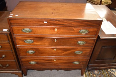 Lot 564 - A small Georgian mahogany chest with four...