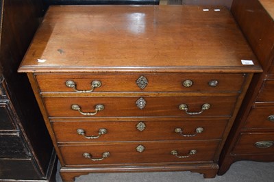 Lot 566 - A small Georgian mahogany chest with four...