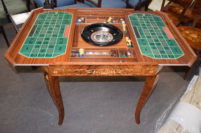 Lot 603 - A 20th Century games compendium table with...