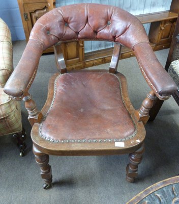 Lot 610 - A Norton of Birmingham leather upholstered bow...