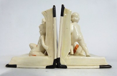 Lot 437 - A pair of ceramic Art Deco book ends