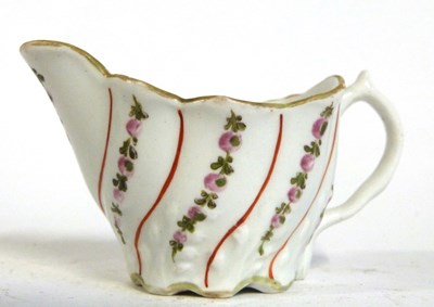 Lot 442 - Lowestoft cream jug in Low Chelsea ewer form...