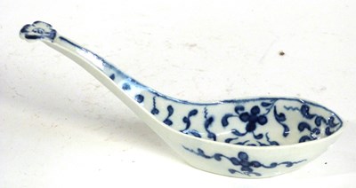 Lot 446 - An 18th Century Worcester rice spoon with blue...