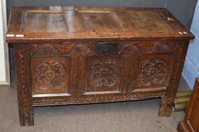 Lot 669 - An 18th Century oak coffer with three panelled...