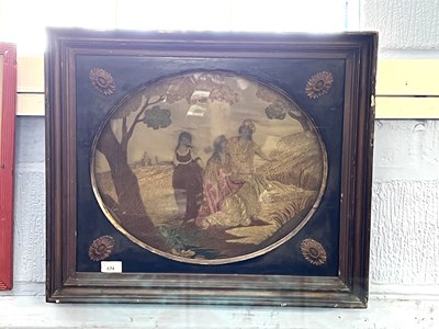 Lot 674 - A 19th Century needlework picture of three...