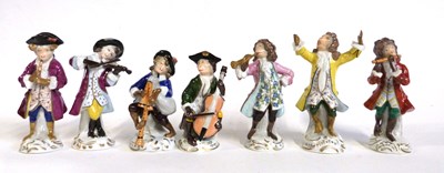 Lot 473 - A group of seven monkey band figures,...