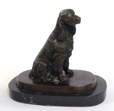 Lot 474 - Resin or Spelter model of a spaniel on oval base