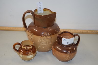 Lot 61 - Two Royal Doulton stone ware harvest type jugs...