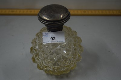 Lot 92 - A silver topped dressing table jar