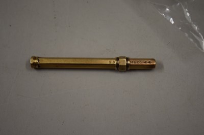 Lot 104 - A  small yellow metal mounted manicure tool...