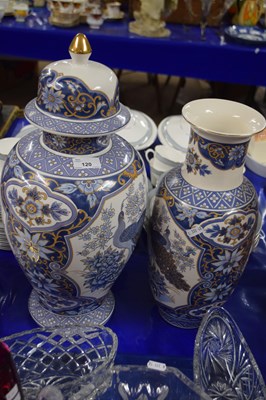 Lot 120 - Two modern Chinese blue and gilt decorated vases