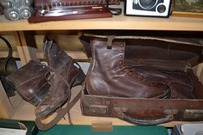 Lot 572 - Leather case, two pairs of vintage ice-skates