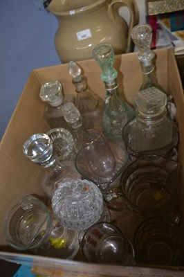 Lot 679 - Box of assorted glassware to include decanters,...