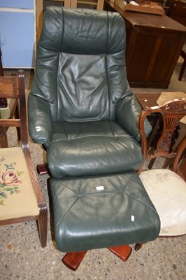 Lot 282 - Green leather upholstered recliner chair and...