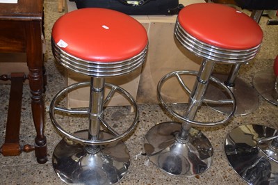 Lot 302 - Pair of red bar stools