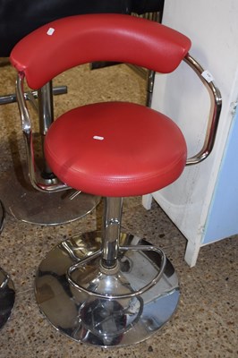 Lot 303 - Red upholstered bar stool with cushioned back