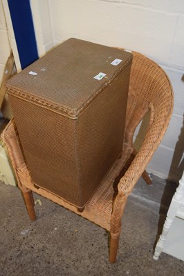 Lot 397 - Wicker armchair and laundry basket