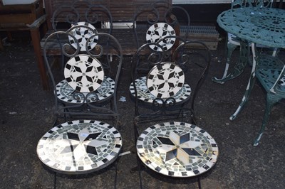 Lot 391 - Four metal framed and tile finished garden chairs