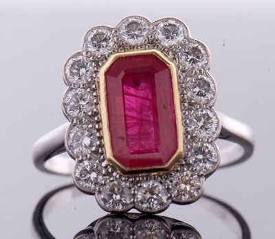 Lot 379 - An 18ct ruby and diamond ring, the octagonal...