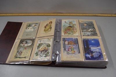 Lot 43 - An album containing a collection of pictorial...