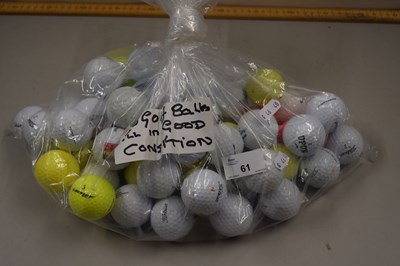 Lot 61 - A bag of fifty assorted golf balls