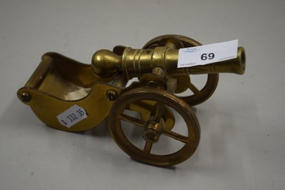 Lot 69 - Brass table top model cannon