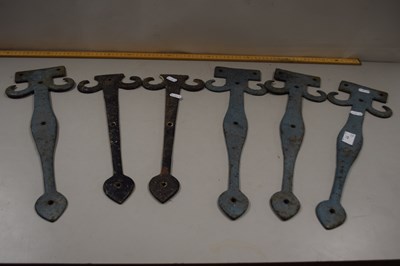 Lot 77 - Three pairs of decorative iron door brackets