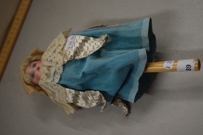 Lot 89 - An unusual antique porcelain headed revolving...