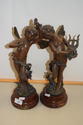 Lot 102 - A pair of bronzed finish Spelter models of...