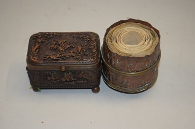 Lot 122 - A copper prayer reel and scrolls together with...