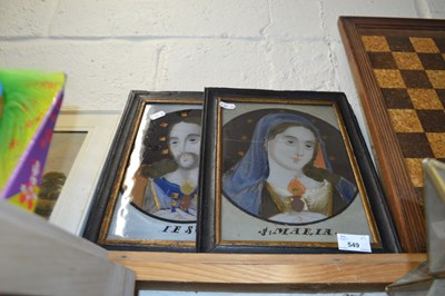 Lot 549 - A pair of glass painted icons