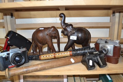 Lot 552 - Mixed Lot:  Carved wooden elephants, truncheon,...