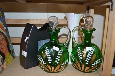 Lot 583 - A pair of green glass decorated...