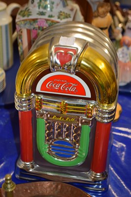 Lot 207 - Novelty Coca Cola storage jar formed as a juke...