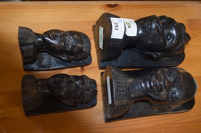 Lot 293 - Group of four African ebonised carved heads as...