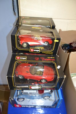 Lot 694 - Quantity of Burago model cars, boxed