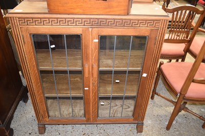 Lot 374 - Early 20th Century oak lead glazed bookcase...