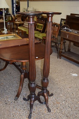 Lot 433 - Near pair of mahogany torchere plant stands,...